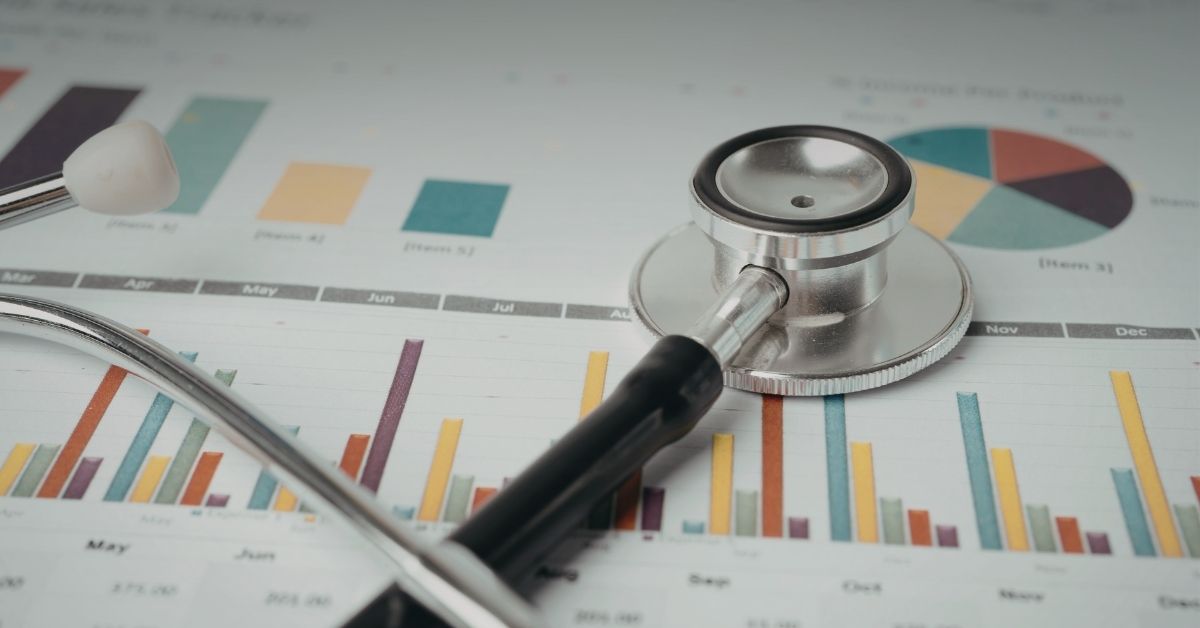 Image of charts on paper, with a stethoscope on top