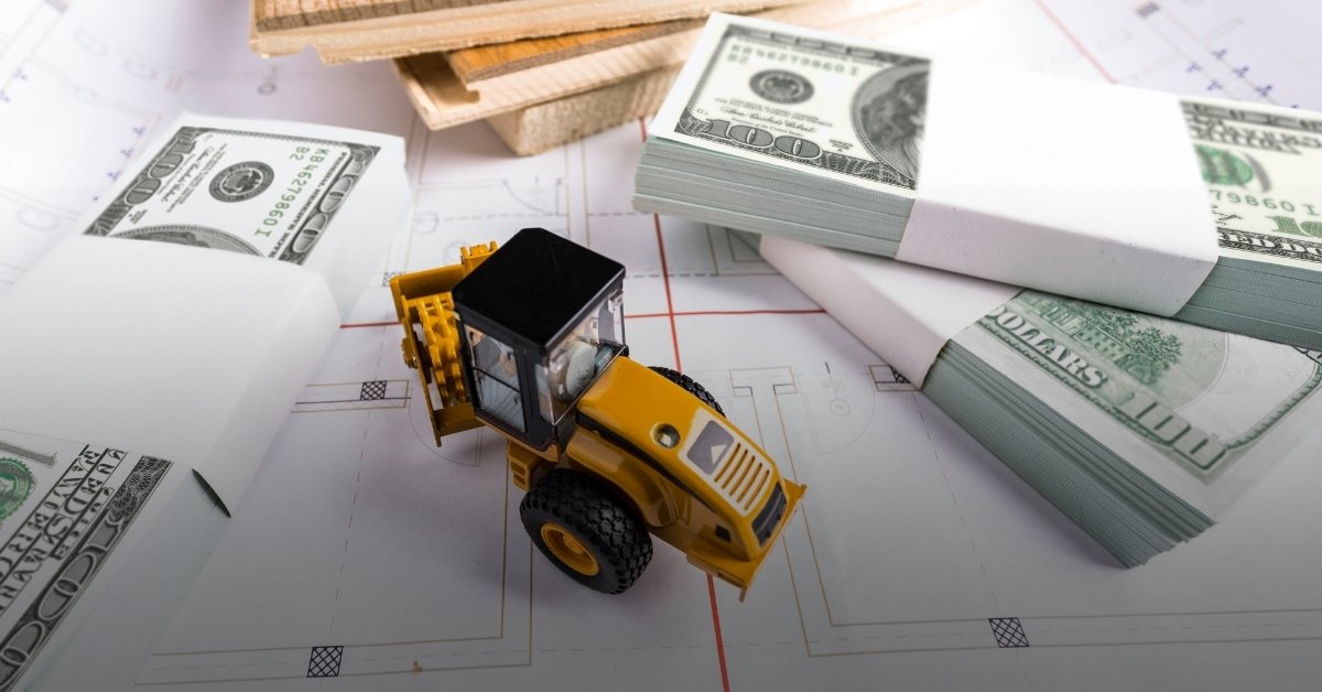 Image of a toy backhoe surrounded by lumber and money