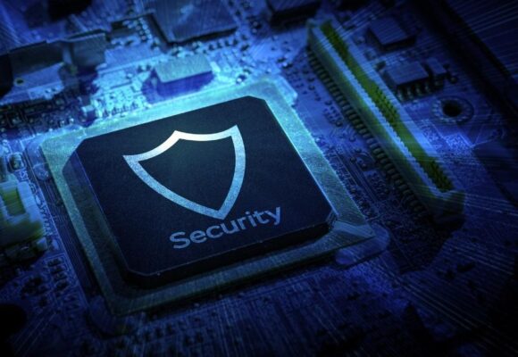 Image of a computer circuit board with a large chip that says 'Security'