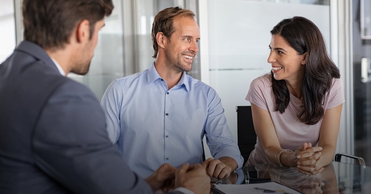 A couple in a meeting with a CPA and Financial Advisor
