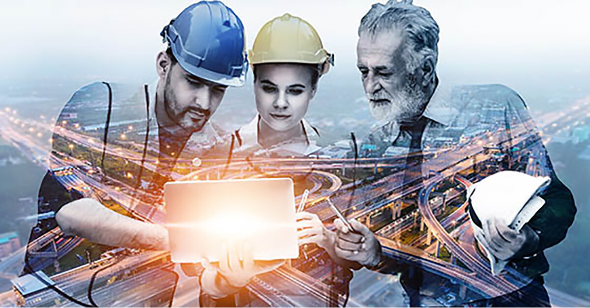 Image of contractors looking at a laptop